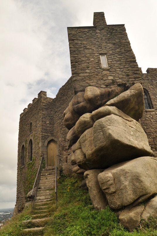 Looking up at Carn Brea castle